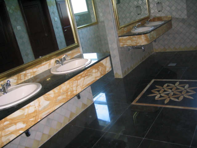 Evan Hotel, Sharjah, (2004). Client Mr. Mohamed bin Jasim Al Midfa. Design Horizon and Main Contractor Al Midfa Construction. Materials used: Antique Rustic Tiles, Botticino Classico, Absolute Black, Desert Beige, Yellow Sienna, Cremo Delicato, Green Maritaka, Red Dragon