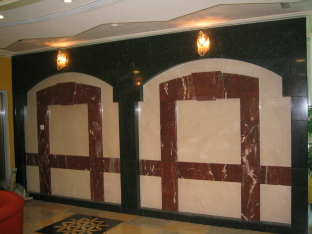 Evan Hotel, Sharjah, (2004). Client Mr. Mohamed bin Jasim Al Midfa. Design Horizon and Main Contractor Al Midfa Construction. Materials used: Antique Rustic Tiles, Botticino Classico, Absolute Black, Desert Beige, Yellow Sienna, Cremo Delicato, Green Maritaka, Red Dragon