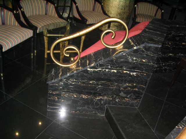 Evan Hotel, Sharjah, (2004). Client Mr. Mohamed bin Jasim Al Midfa. Design Horizon and Main Contractor Al Midfa Construction. Materials used: Antique Rustic Tiles, Botticino Classico, Absolute Black, Desert Beige, Yellow Sienna, Cremo Delicato, Green Maritaka, Red Dragon