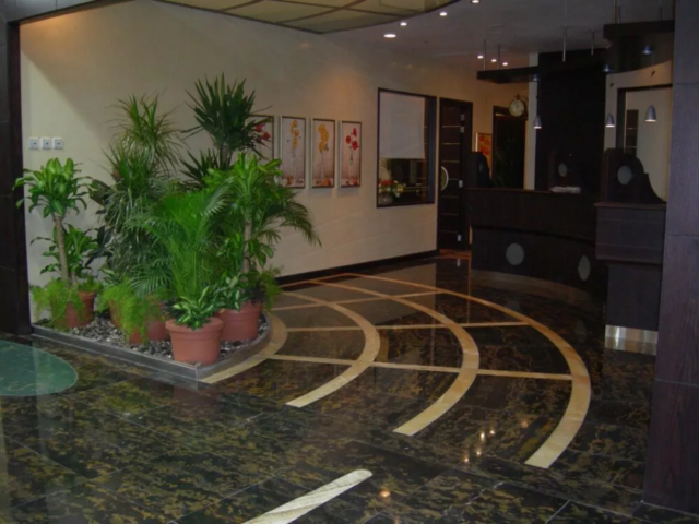 Premier Financial Brokerage, Dubai (2006). Design RG Concept Materials used: Red Onyx, Yellow Gold, King Gold, Black Mongolian Granite, Gold Onyx